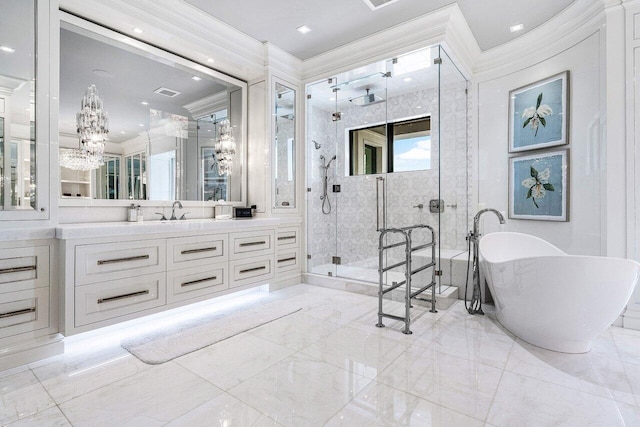 bathroom with ornamental molding, separate shower and tub, and vanity