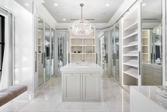 spacious closet with a notable chandelier