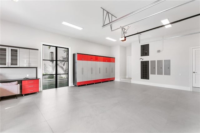16071 Quiet Vista Cir, Delray Beach, FL 33446 - garage with a garage door opener and electric panel