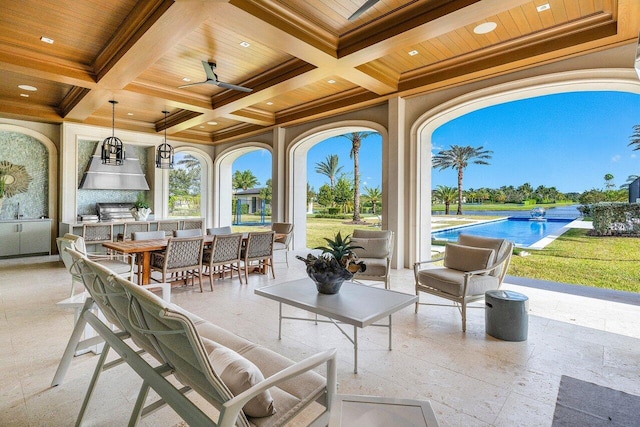 16071 Quiet Vista Cir, Delray Beach, FL 33446 - view of patio / terrace with an outdoor pool, an outdoor kitchen, ceiling fan, and outdoor dining area