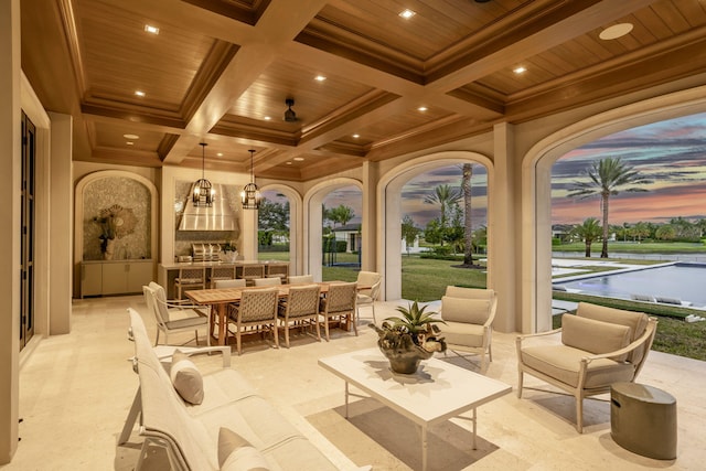 patio terrace at dusk with a large fireplace