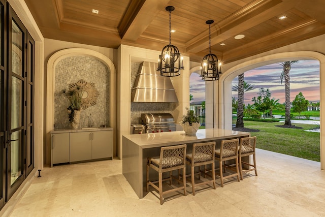16071 Quiet Vista Cir, Delray Beach, FL 33446 - patio terrace at dusk with an outdoor kitchen, a grill, outdoor wet bar, a yard, and a sink