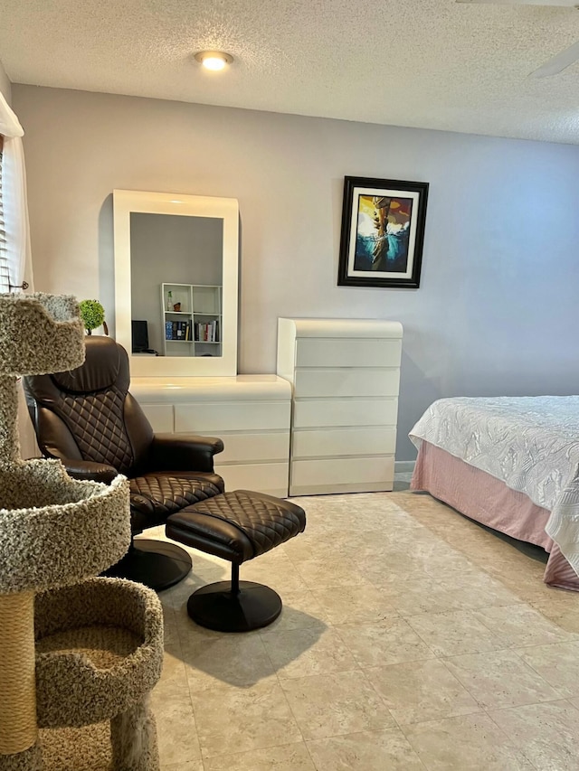 bedroom with a textured ceiling