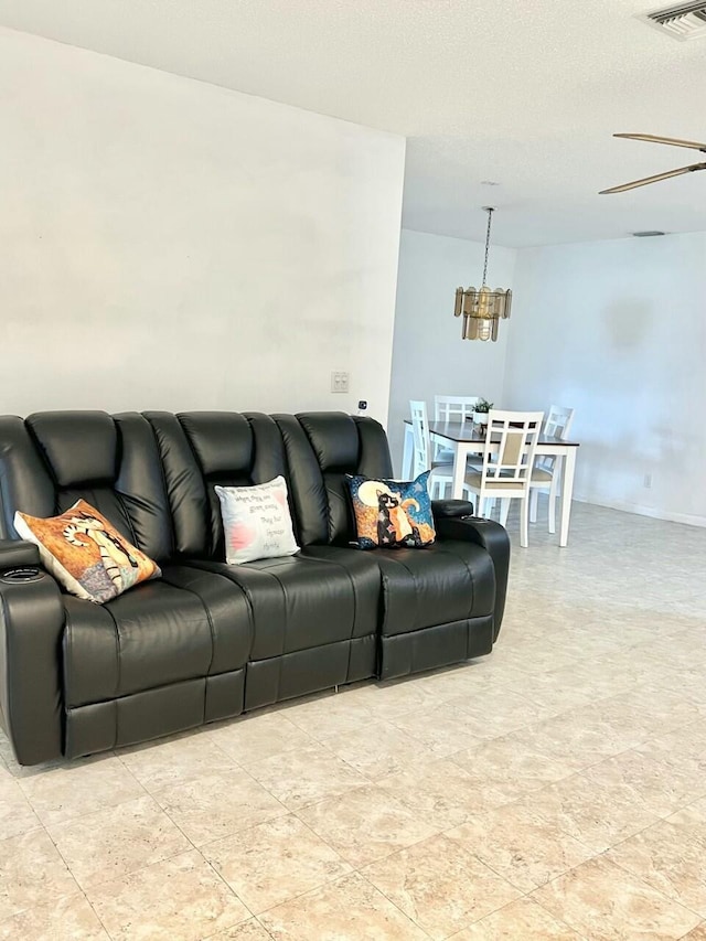 living room with ceiling fan