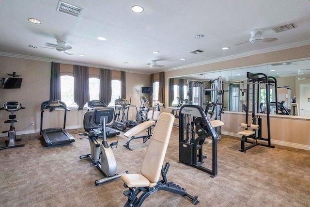 gym with ceiling fan, light carpet, and ornamental molding