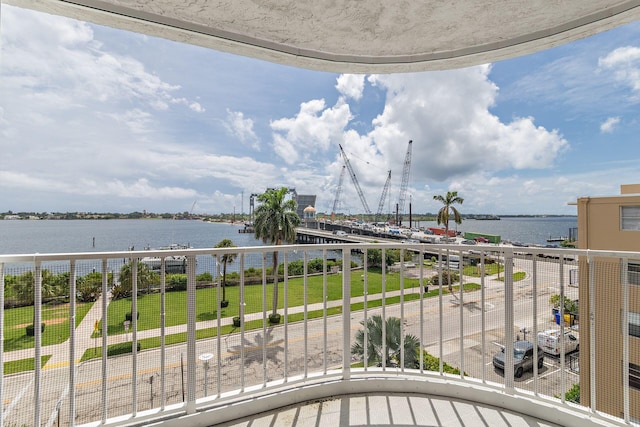 balcony featuring a water view