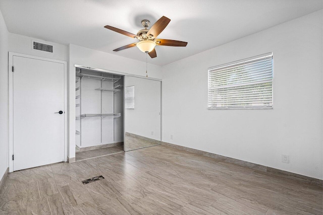 unfurnished bedroom featuring a closet, ceiling fan, and light hardwood / wood-style floors