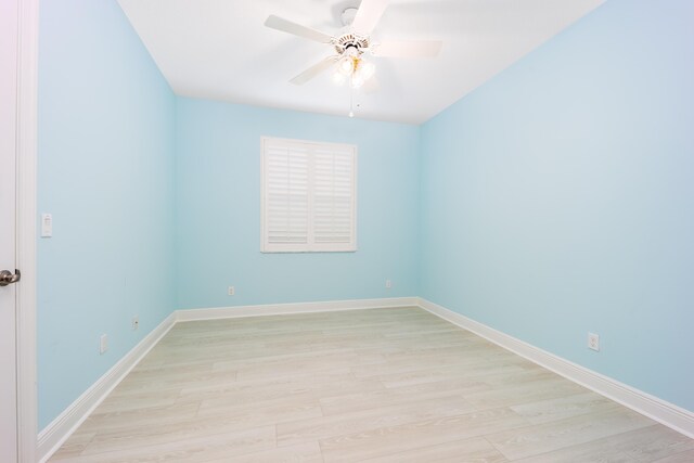 unfurnished room featuring light hardwood / wood-style flooring and ceiling fan