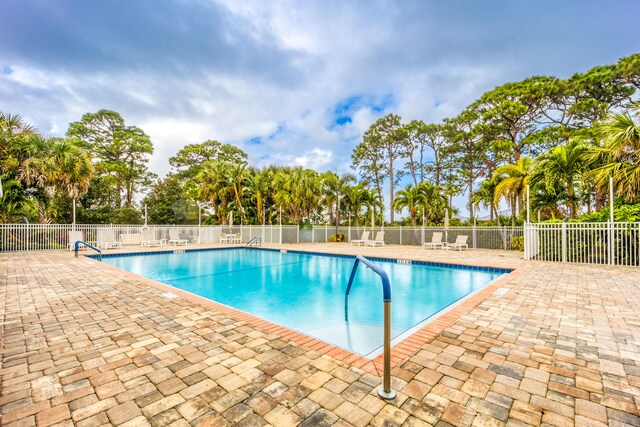 view of pool with a patio area