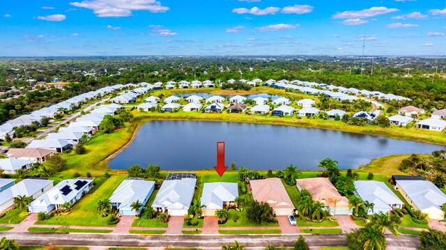 bird's eye view with a water view