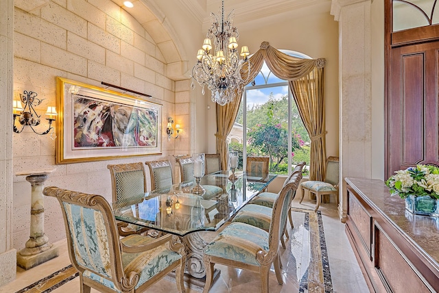 dining space with an inviting chandelier