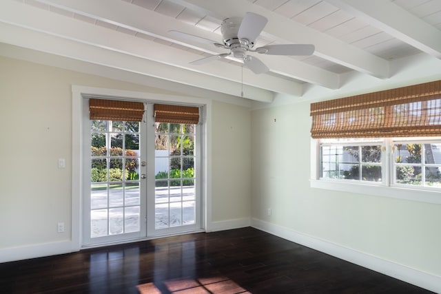 unfurnished room with ceiling fan, dark wood-type flooring, a wealth of natural light, and french doors