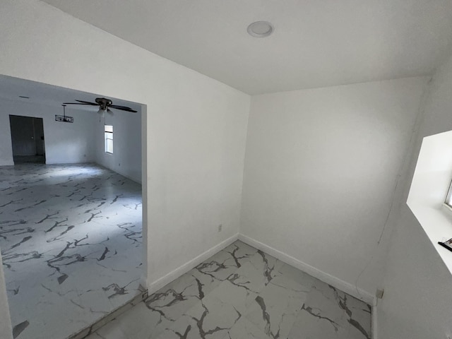 empty room featuring ceiling fan