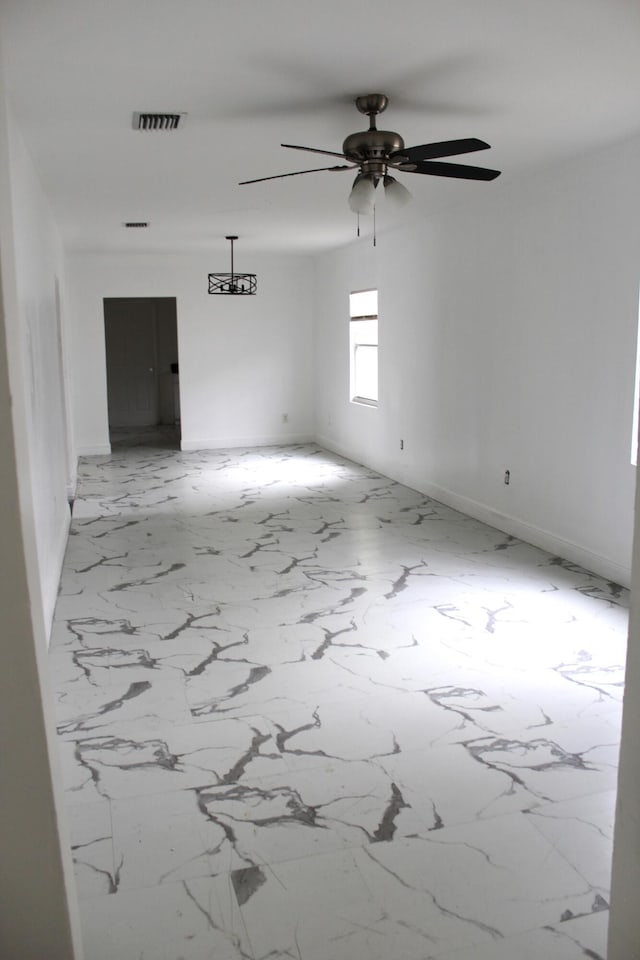 empty room with ceiling fan