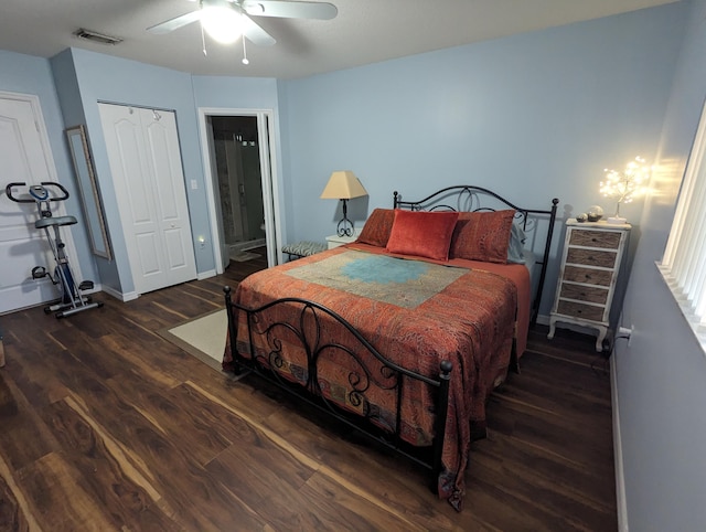 bedroom featuring dark hardwood / wood-style flooring, a closet, and ceiling fan