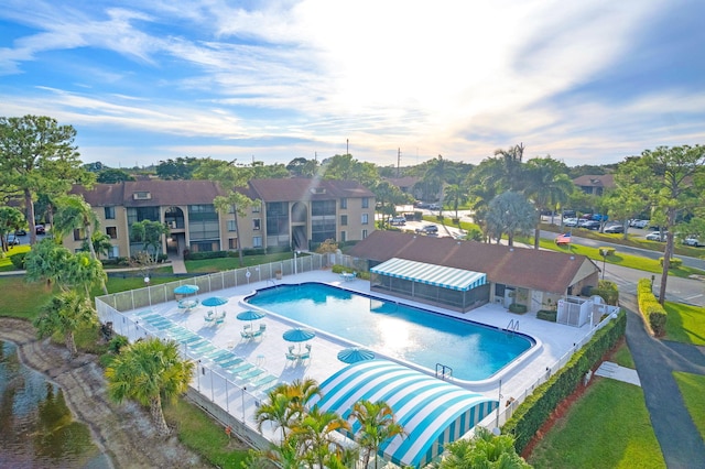 view of swimming pool with a patio