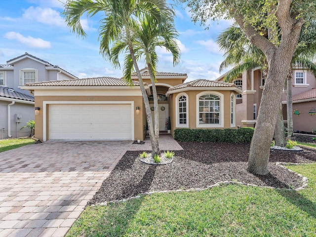 view of front of property with a garage