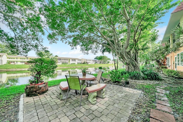 view of patio / terrace featuring a water view