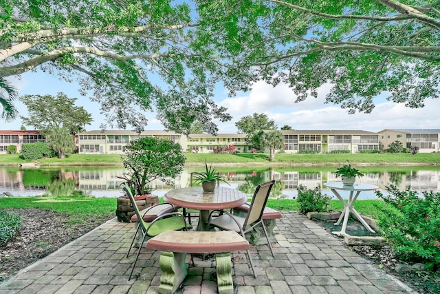 view of patio / terrace featuring a water view