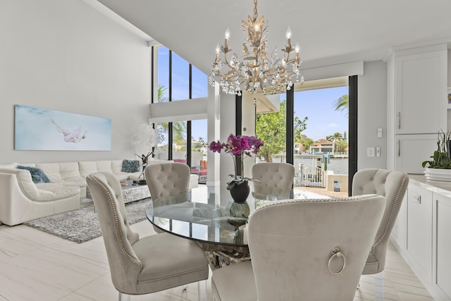 dining area with an inviting chandelier