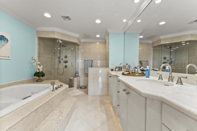 bathroom with ornamental molding, vanity, and independent shower and bath