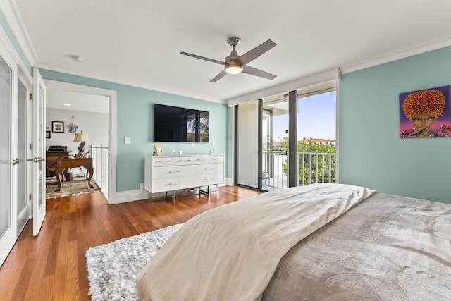 bedroom with hardwood / wood-style flooring, ornamental molding, access to exterior, and ceiling fan