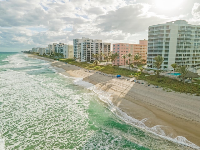 aerial view featuring a beach view and a water view