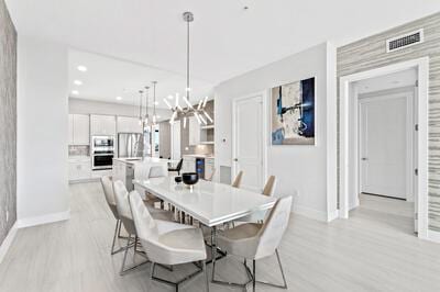 dining area featuring light hardwood / wood-style flooring