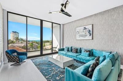 living room featuring expansive windows