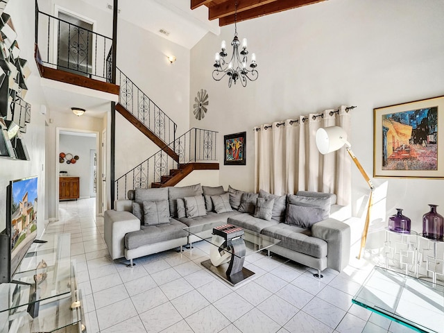 tiled living room with beamed ceiling, high vaulted ceiling, and a notable chandelier