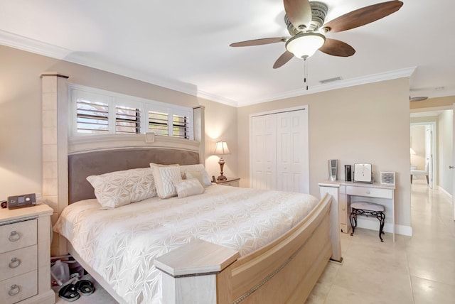 bedroom with ceiling fan, a closet, and crown molding