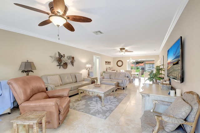 living room featuring light tile patterned flooring, ceiling fan with notable chandelier, and ornamental molding