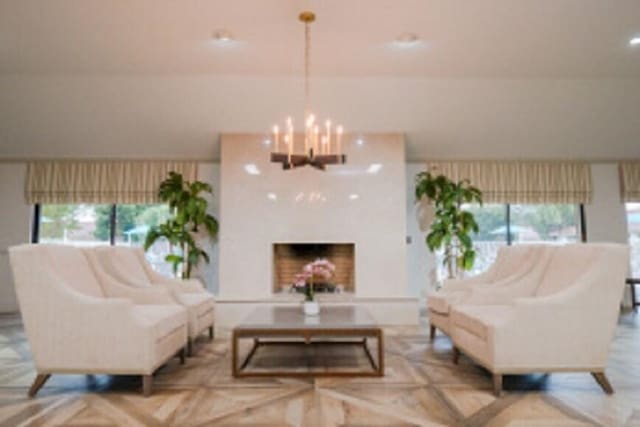 living room with an inviting chandelier