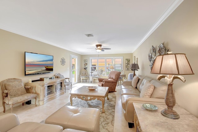 living room with ceiling fan, crown molding, and light tile patterned floors