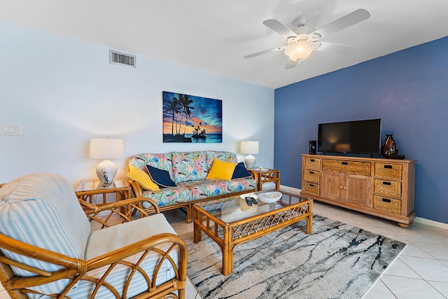 tiled living room featuring ceiling fan