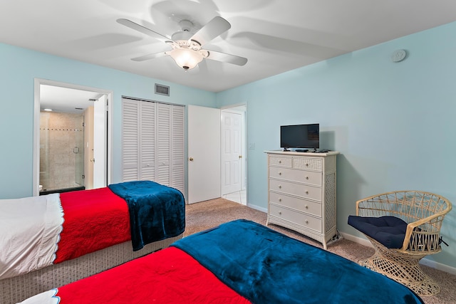 carpeted bedroom with ceiling fan and a closet