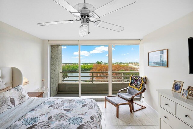 bedroom with light hardwood / wood-style floors, multiple windows, and ceiling fan