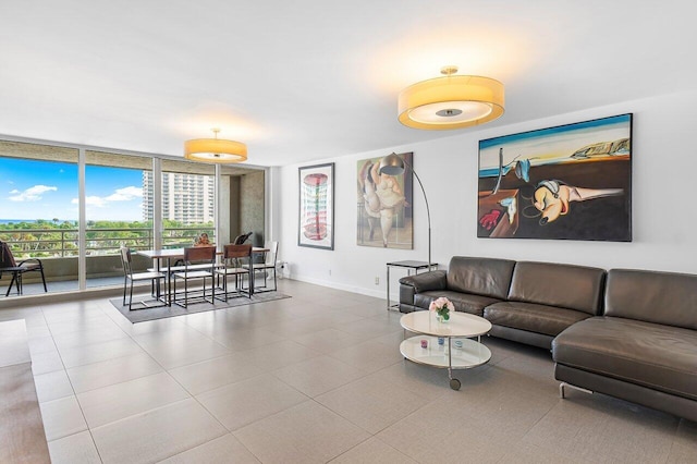 living room featuring a wall of windows