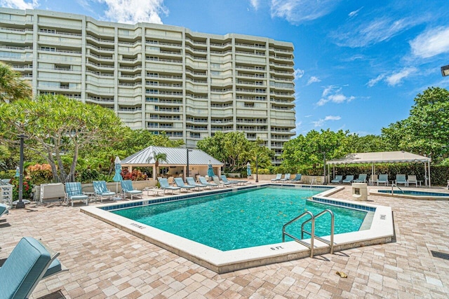 view of pool featuring a gazebo and a patio