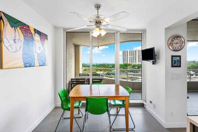 bedroom featuring access to outside and ceiling fan