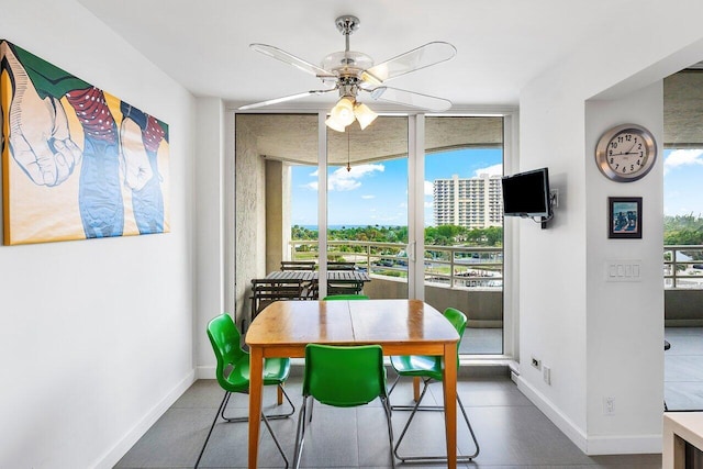 dining area with ceiling fan