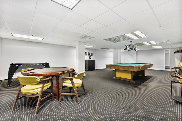 recreation room featuring a drop ceiling, billiards, and dark colored carpet