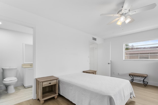 bedroom featuring ceiling fan and light hardwood / wood-style flooring