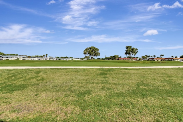 view of community with a lawn