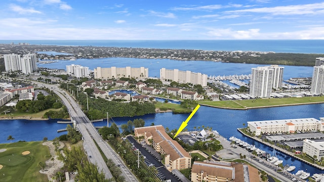 birds eye view of property featuring a water view