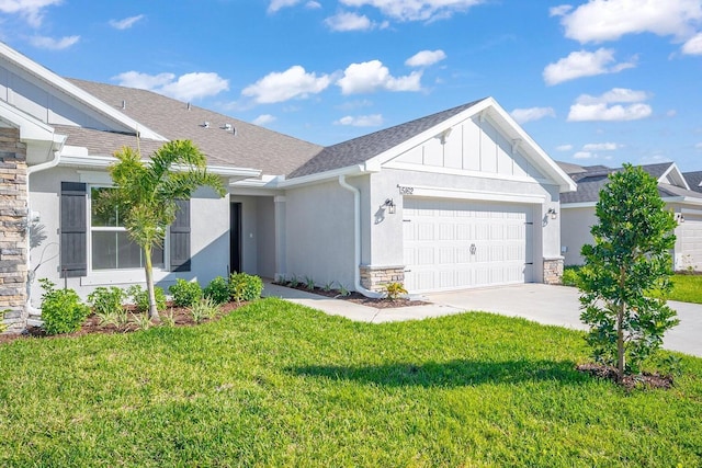 ranch-style house featuring a front lawn and a garage