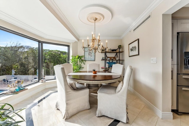 dining area featuring a chandelier, light tile patterned floors, and crown molding