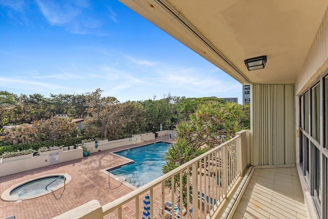 balcony featuring a community hot tub