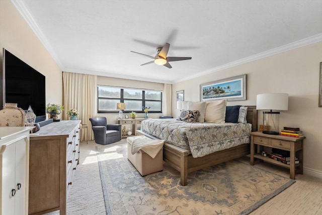 bedroom featuring ceiling fan and crown molding