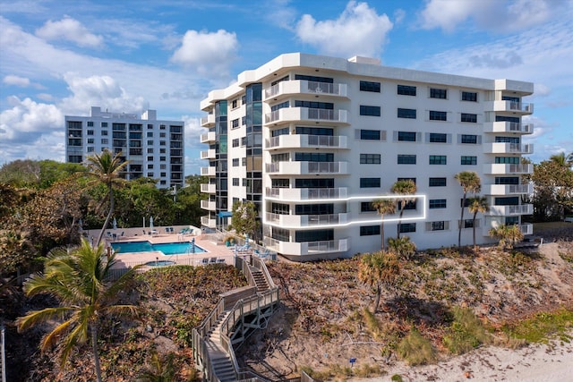 view of property with a community pool